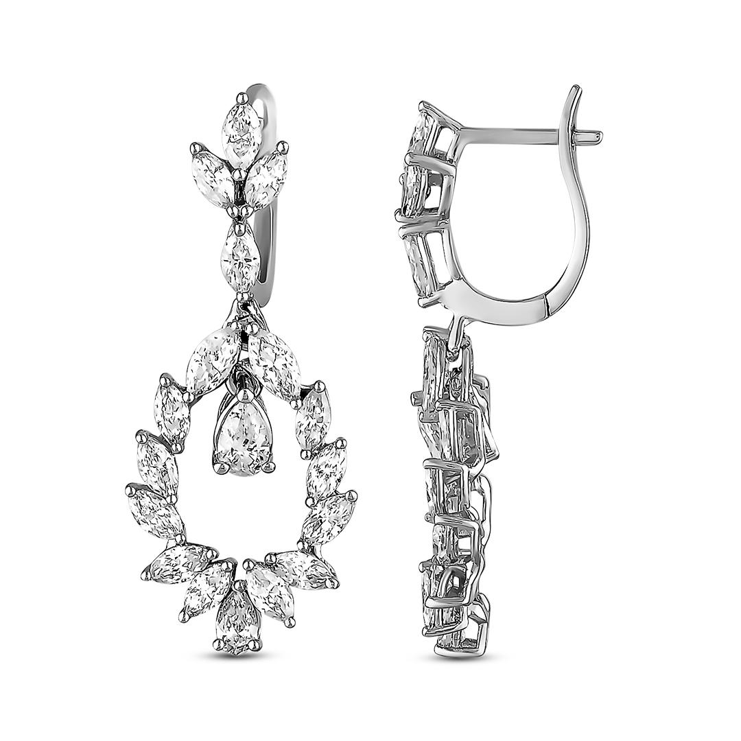 These earrings are simply stunning! Marquise-cut diamonds in 18K white gold create an elegant and timeless look. 
Whether you're dressing up for a special event or just accenting your everyday style, these earrings add a touch of luxury.

Diamond: