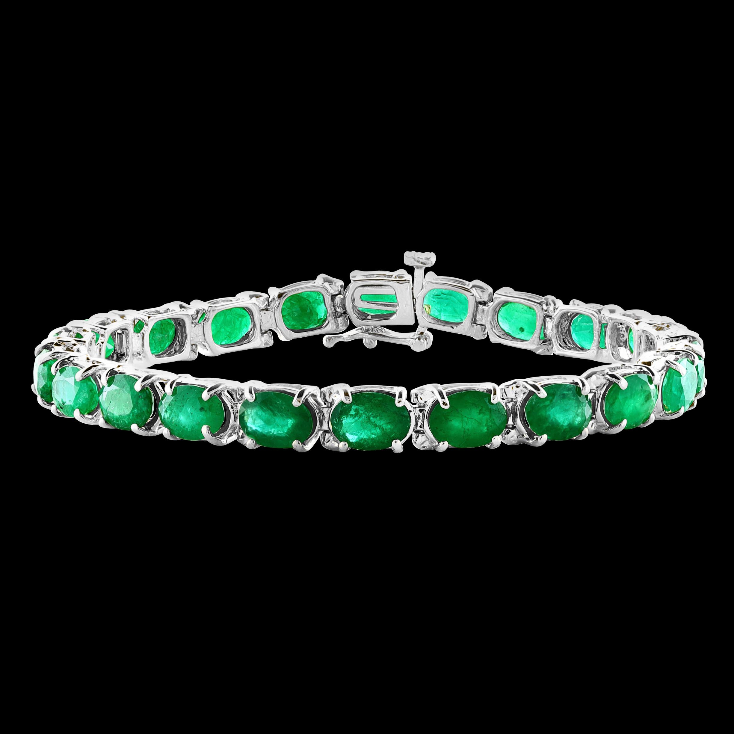  This exceptionally affordable Tennis  bracelet has  21 stones of oval  Emeralds  .  Total weight of the Emeralds is  approximately 28 carat. 
The bracelet is expertly crafted with 19 grams of  14 karat White  gold . Have a safety clasp .
Standard 7