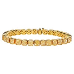 Pulsera tipo «tennis» con diamantes naturales amarillos «fancy» de 28 quilates, talla «radiant», en oro de 18 quilates