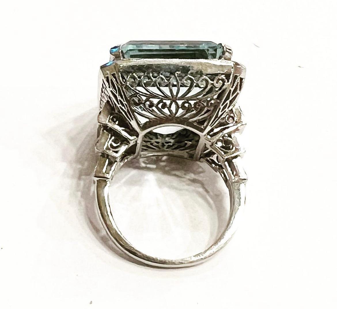 Art Deco 28 Carat Octagonal Cut Aquamarine Diamonds Onyx Platinum Cocktail  Ring For Sale