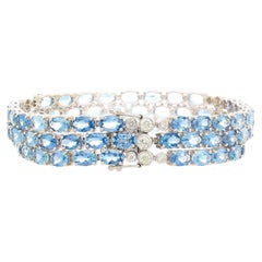 Pulsera de tenis de 3 filas con aguamarina talla oval de 28 quilates