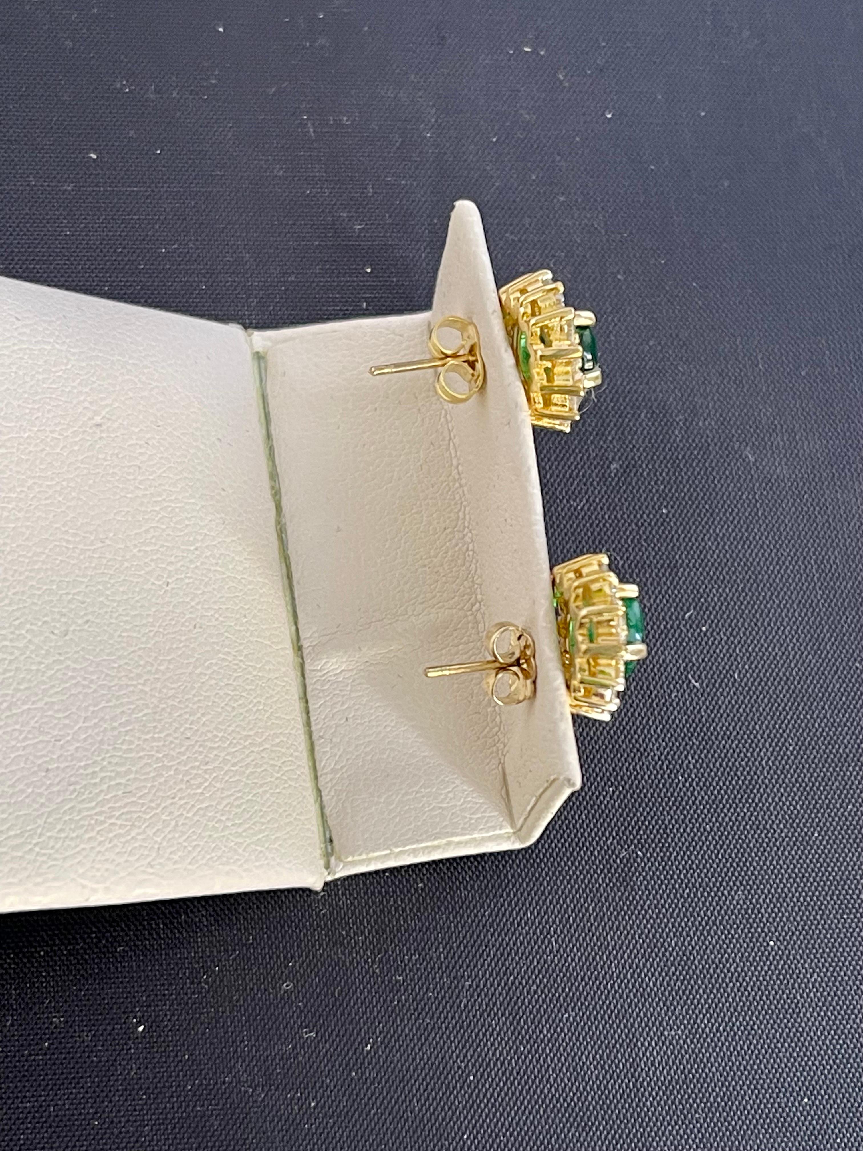 2.8 Carat Oval Shape Emerald and Diamond Post Back Earrings 14 Karat Yellow Gold 10