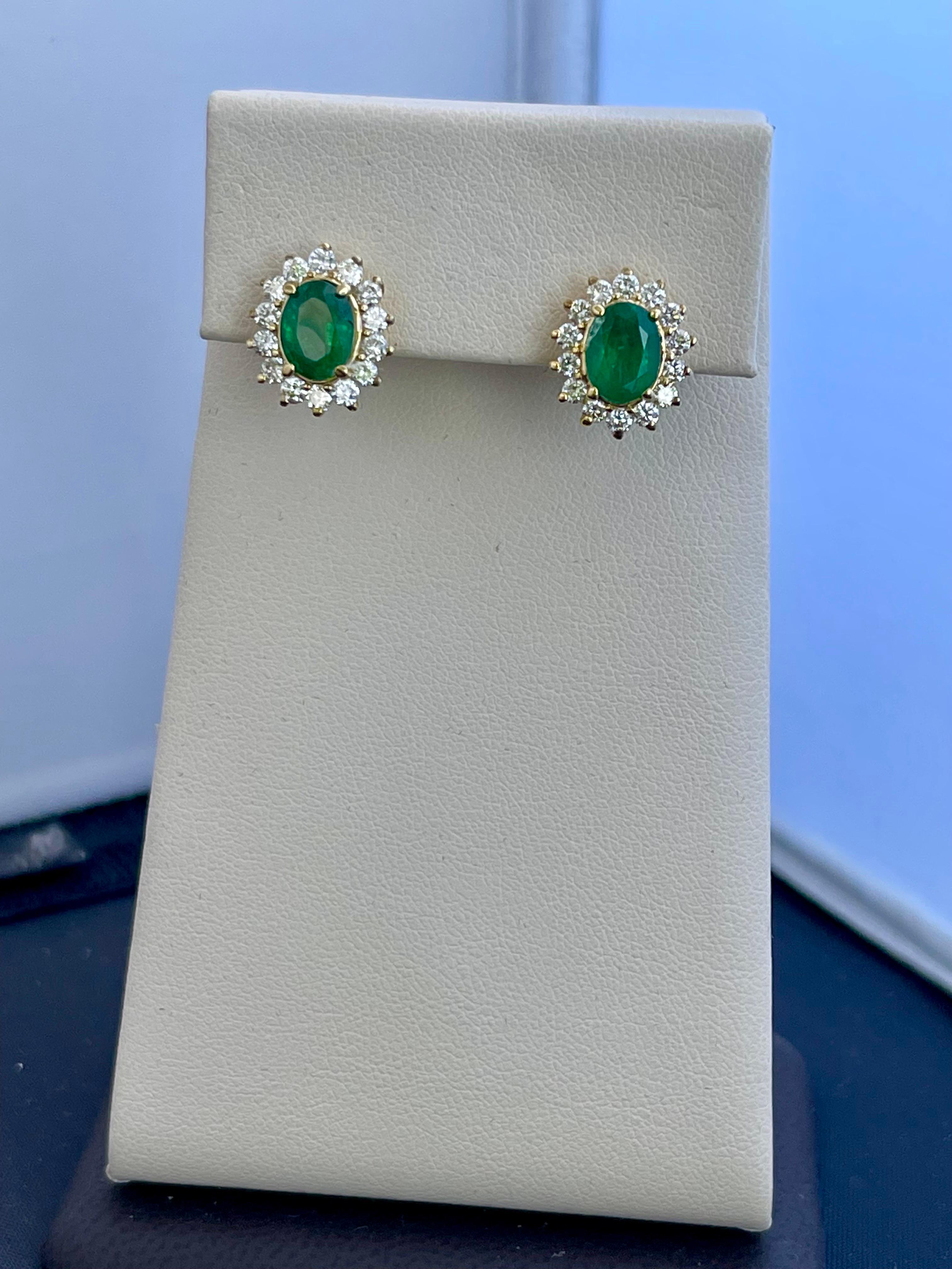 2.8 Carat Oval Shape Emerald and Diamond Post Back Earrings 14 Karat Yellow Gold 11