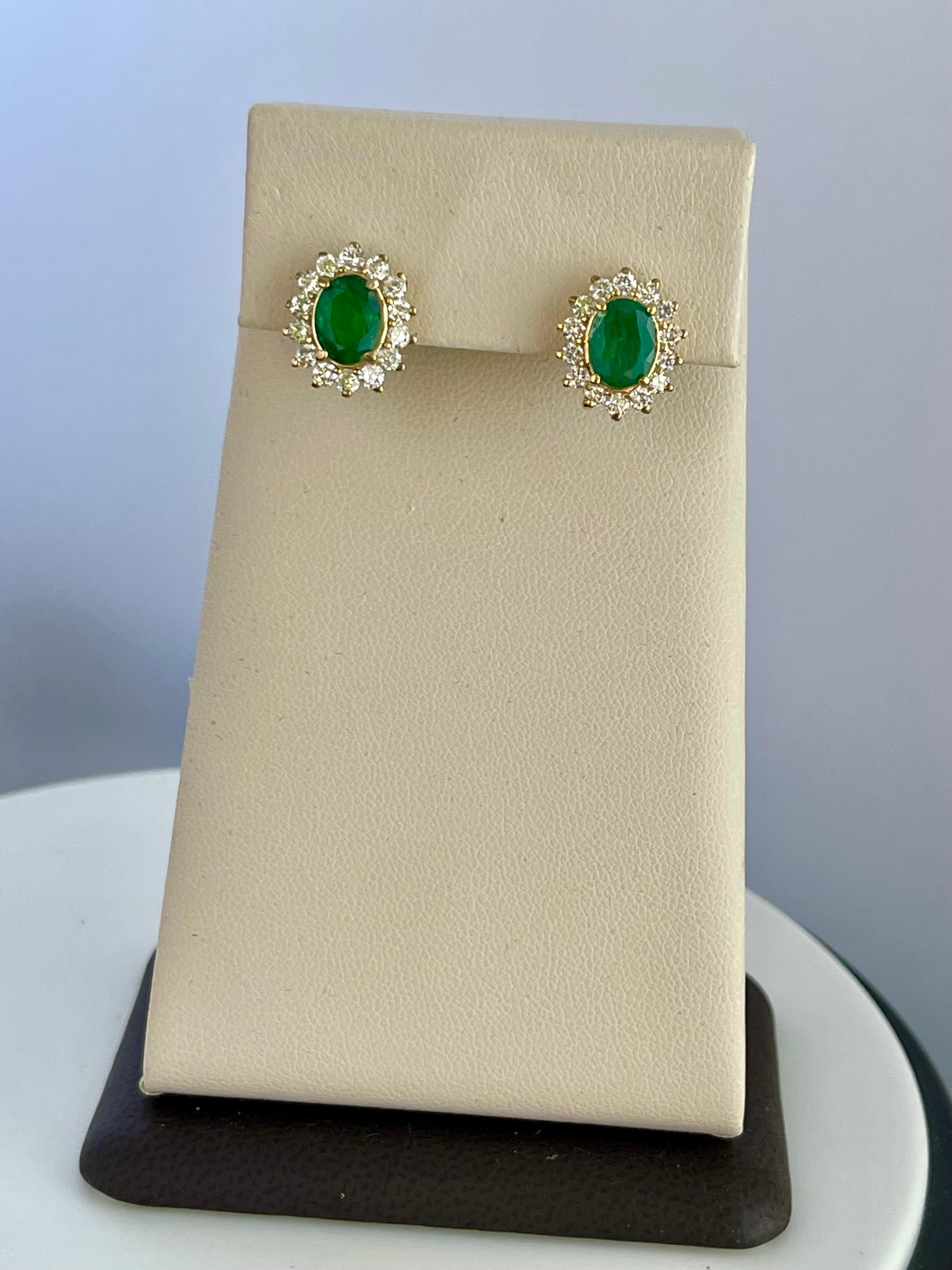 2.8 Carat Oval Shape Emerald and Diamond Post Back Earrings 14 Karat Yellow Gold 12