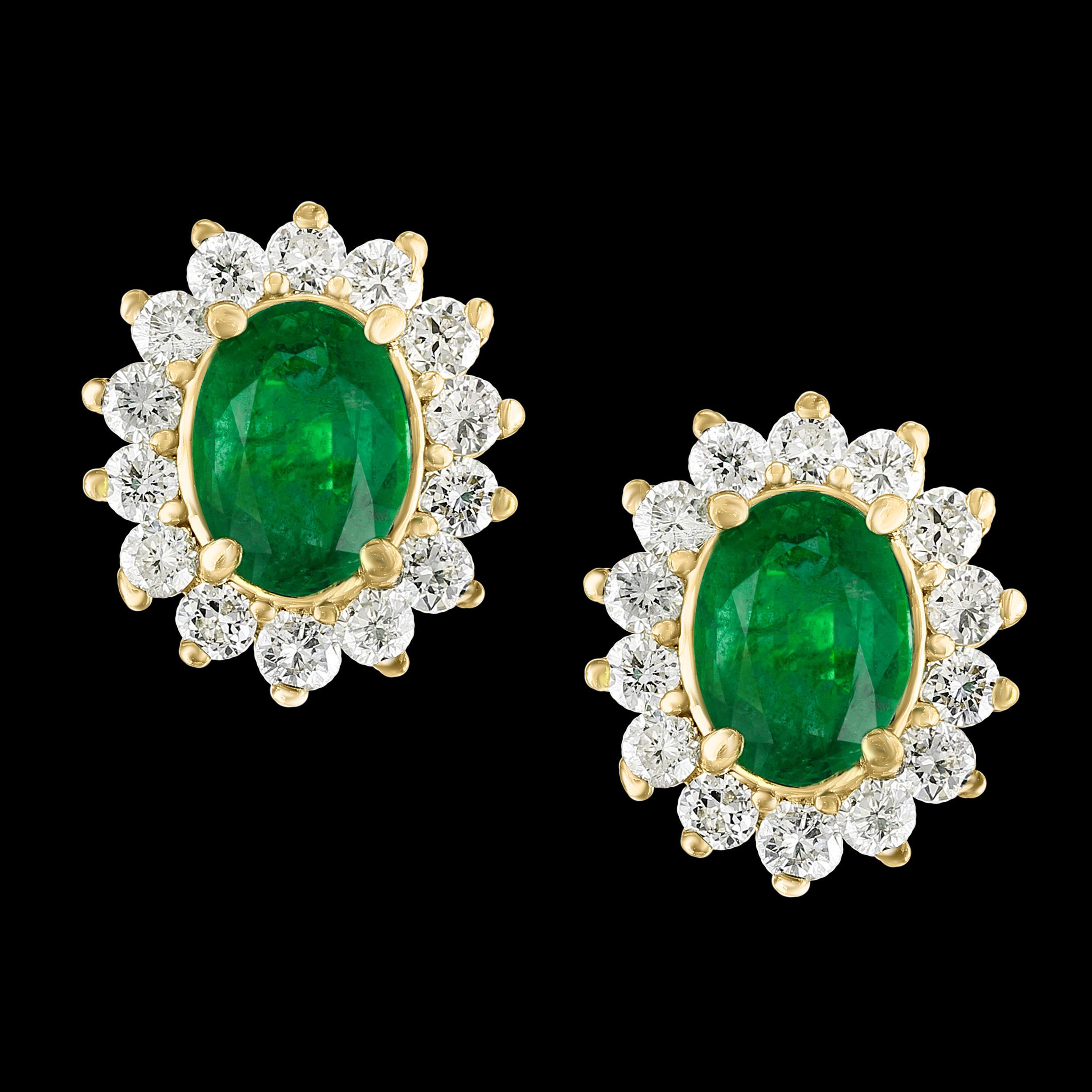 Oval Cut 2.8 Carat Oval Shape Emerald and Diamond Post Back Earrings 14 Karat Yellow Gold