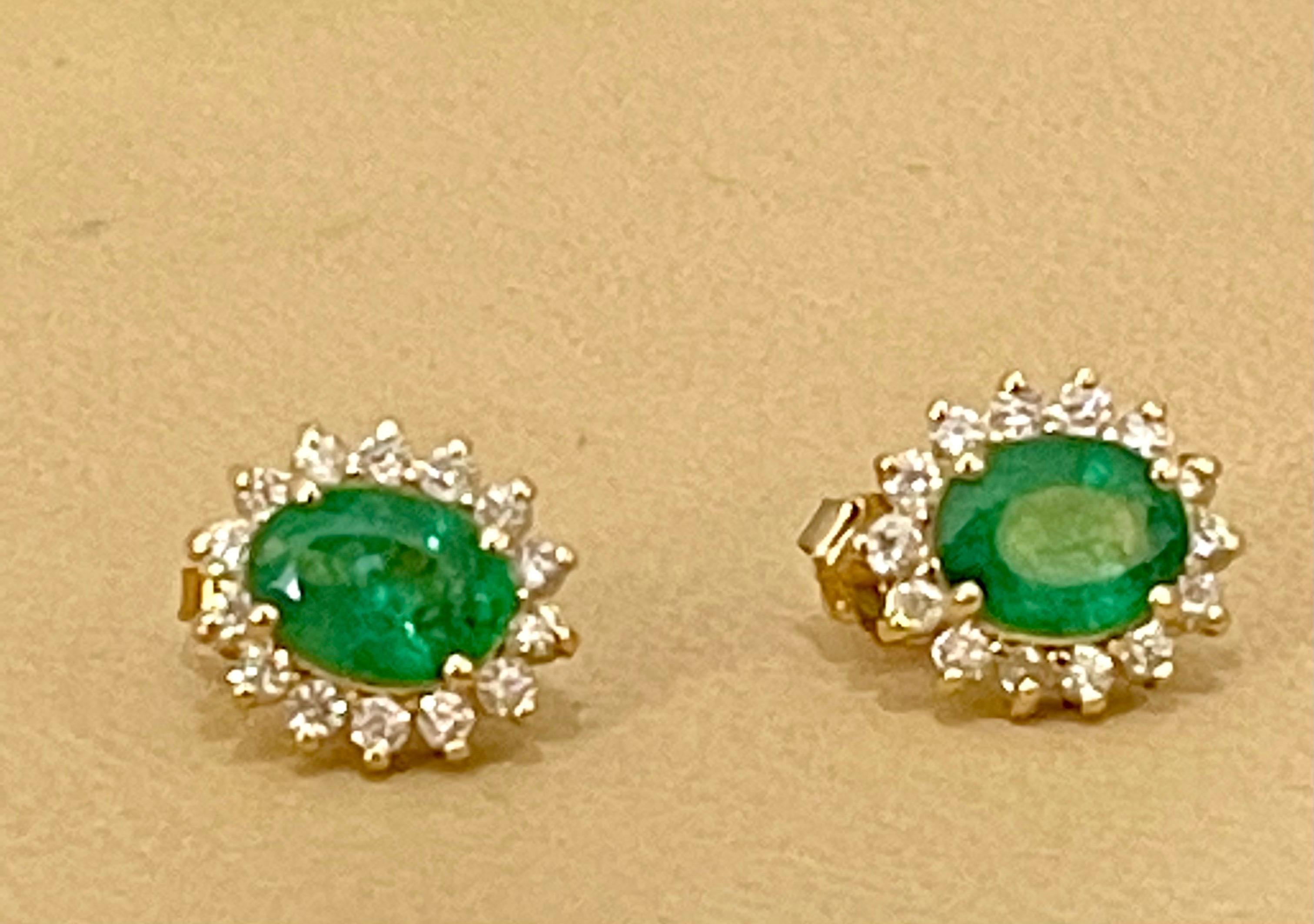 2.8 Carat Oval Shape Emerald and Diamond Post Back Earrings 14 Karat Yellow Gold 2
