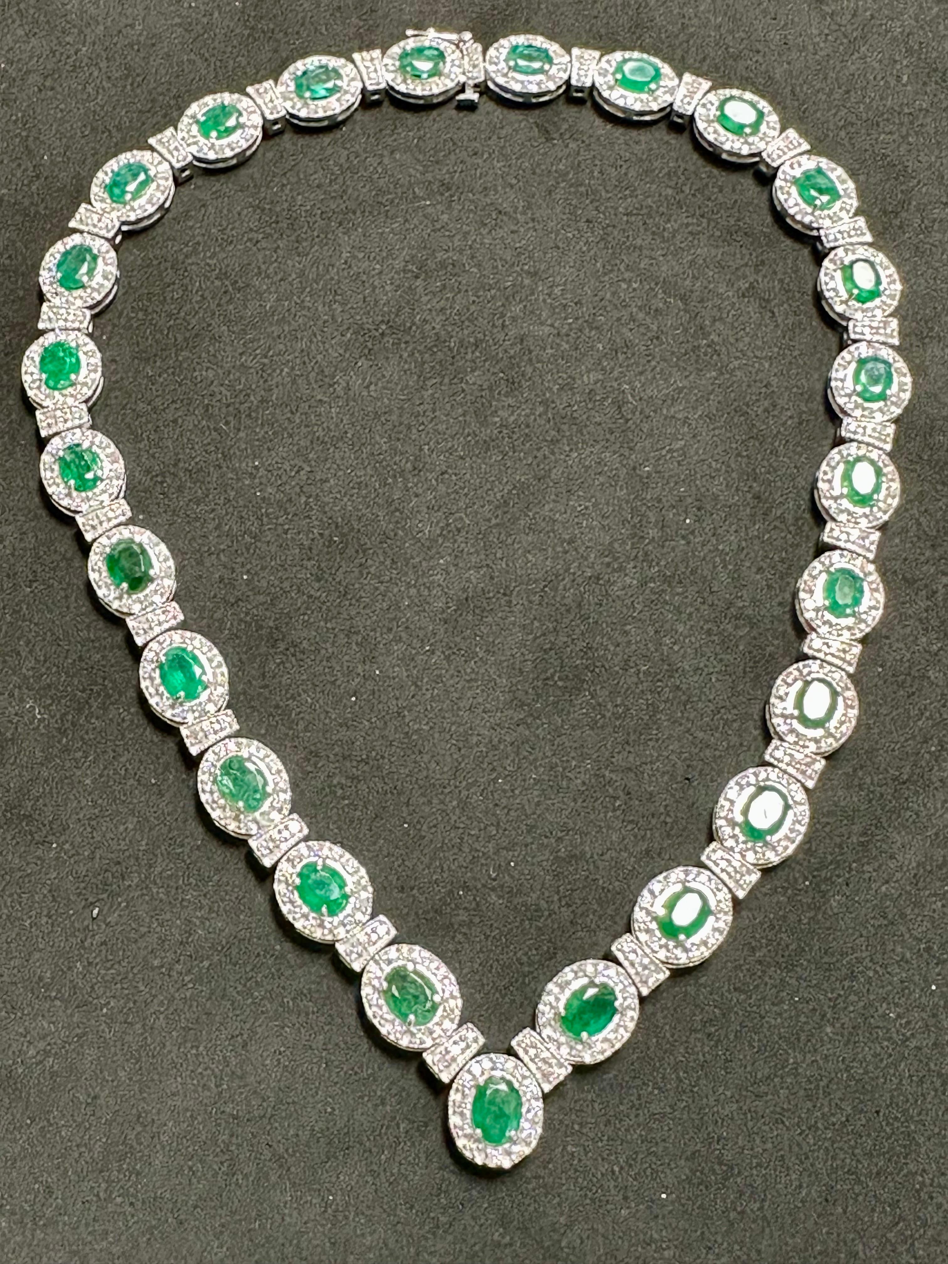 28 Carat Oval Shape Natural Emerald & 5 Carat Diamond Necklace in 14 Karat Gold
This spectacular Bridal  Necklace  consisting of 25 oval shape emeralds , each emerald approximately 1 to 1.10 Carat Each.
 Oval emerald is surrounded by brilliant cut