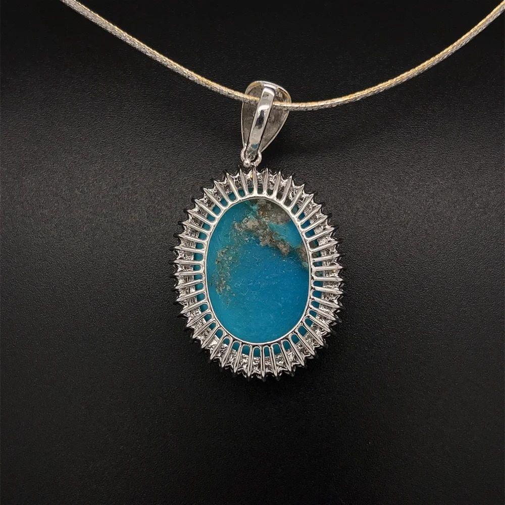 28 Carat Oval Turquoise and Diamond Gold Vintage Halo Pendant Necklace  In Excellent Condition For Sale In Montreal, QC