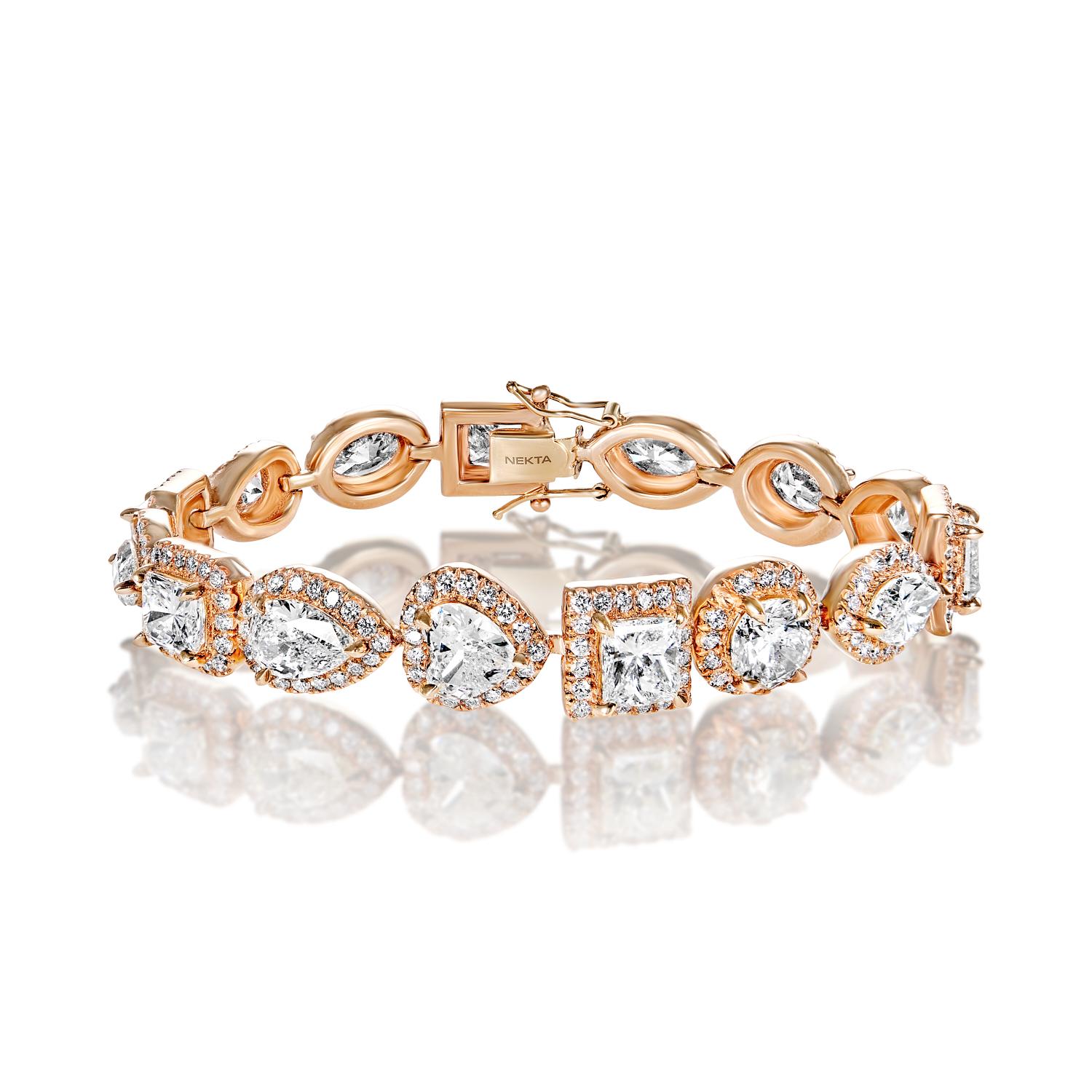 The ESMERALDA 28 Carats Diamond Halo Bracelet features COMBINE MIX SHAPE DIAMONDS brilliants weighing a total of approximately 28 carats, set in 18K Rose Gold.

Style:
Main Diamonds:
Diamond Size: 23.16 Carats
Diamond Shape: Combine Mix Shape