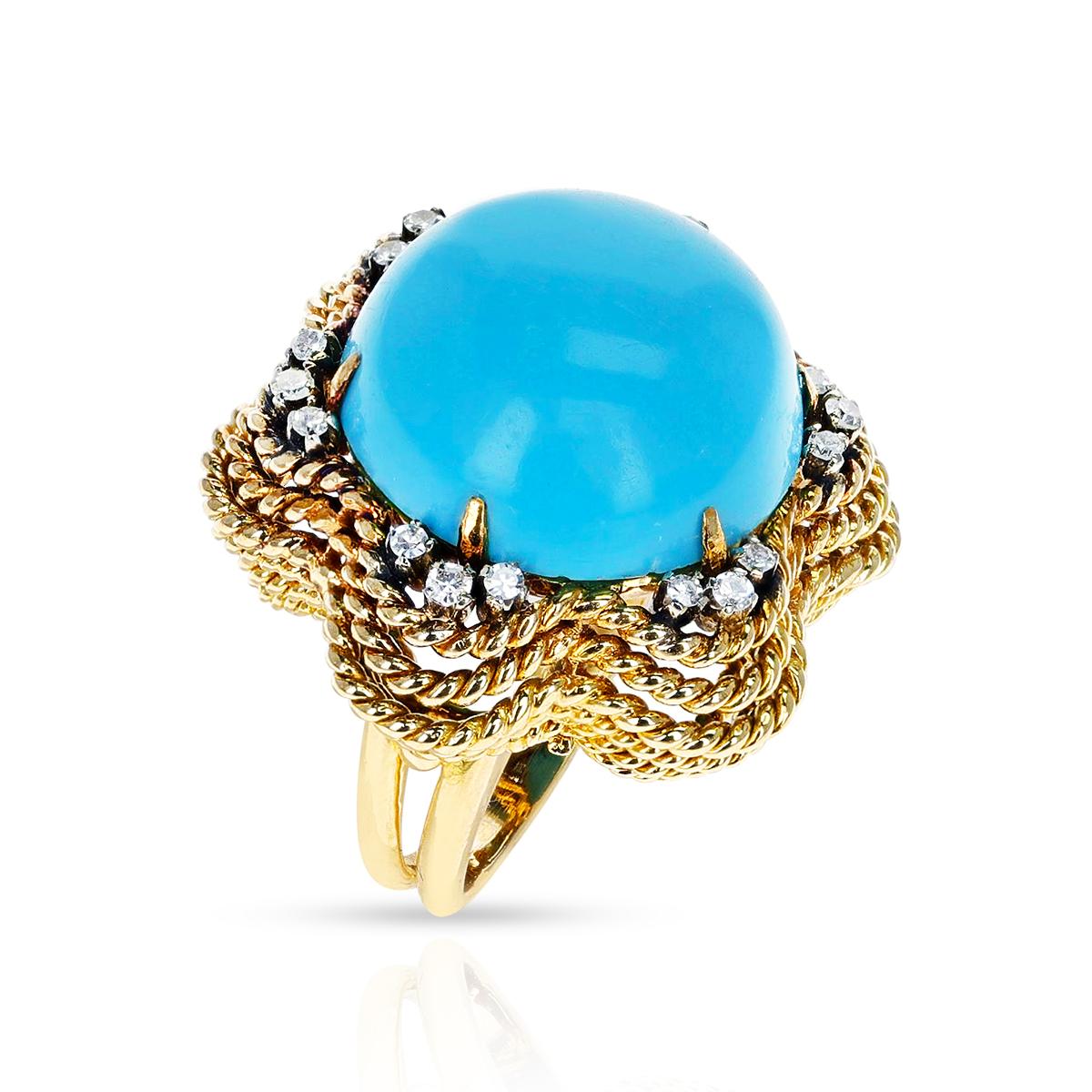 A 28 ct. Turquoise and Diamond Cocktail Ring made in 18 Karat Yellow Gold. The total weight of the ring is 15.2 grams. The ring size is US 4. 