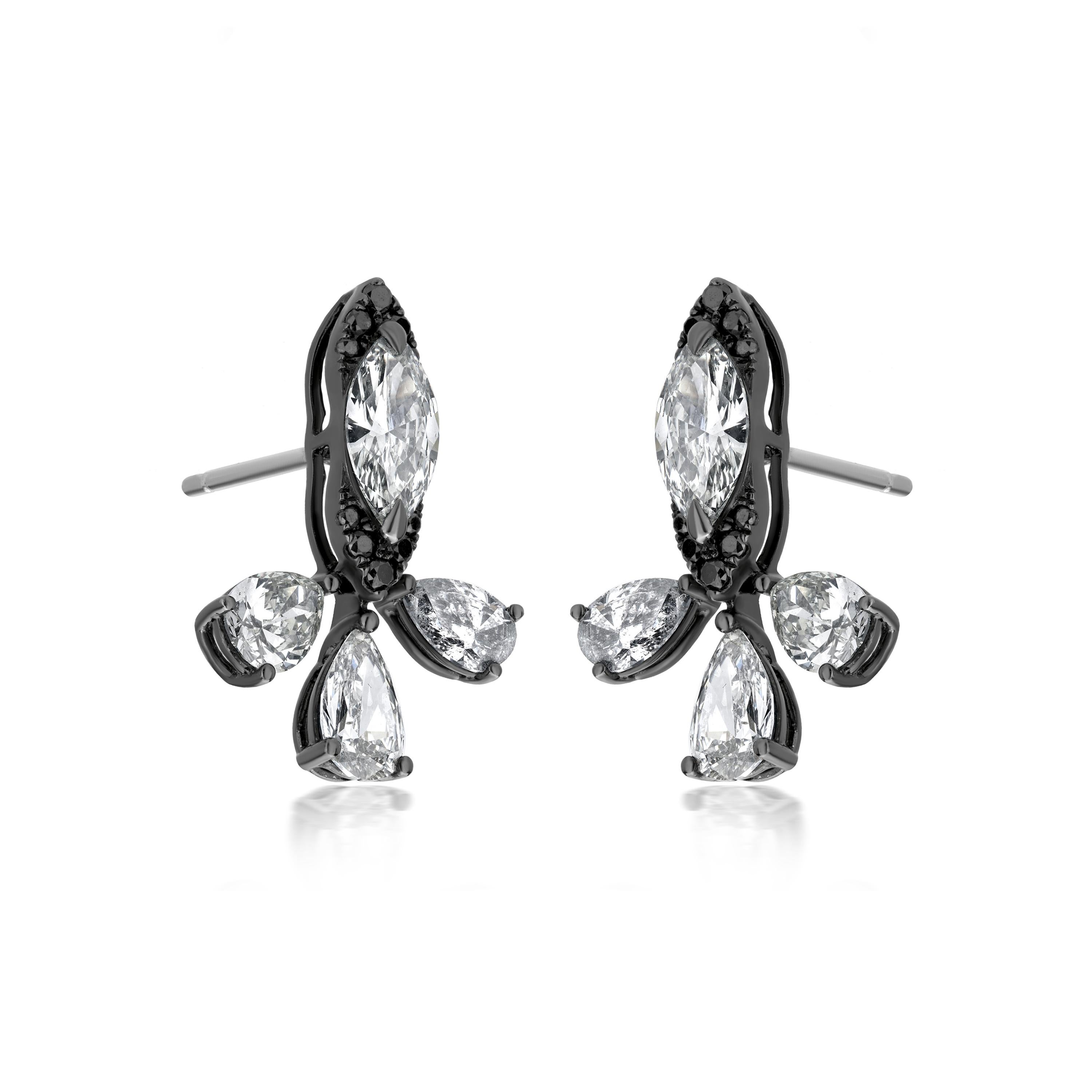 These chic on-ear studs are made by Luxle with a fusion of black and white diamonds. The surmount features a marquise diamond cased in a halo of black diamonds. Three pear diamonds hang from the surmount like bells.
Please follow the Luxury Jewels