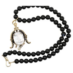 28 Ct White Topaz Pendant Pearl Enamel Yellow Gold Onyx Beads, 1890