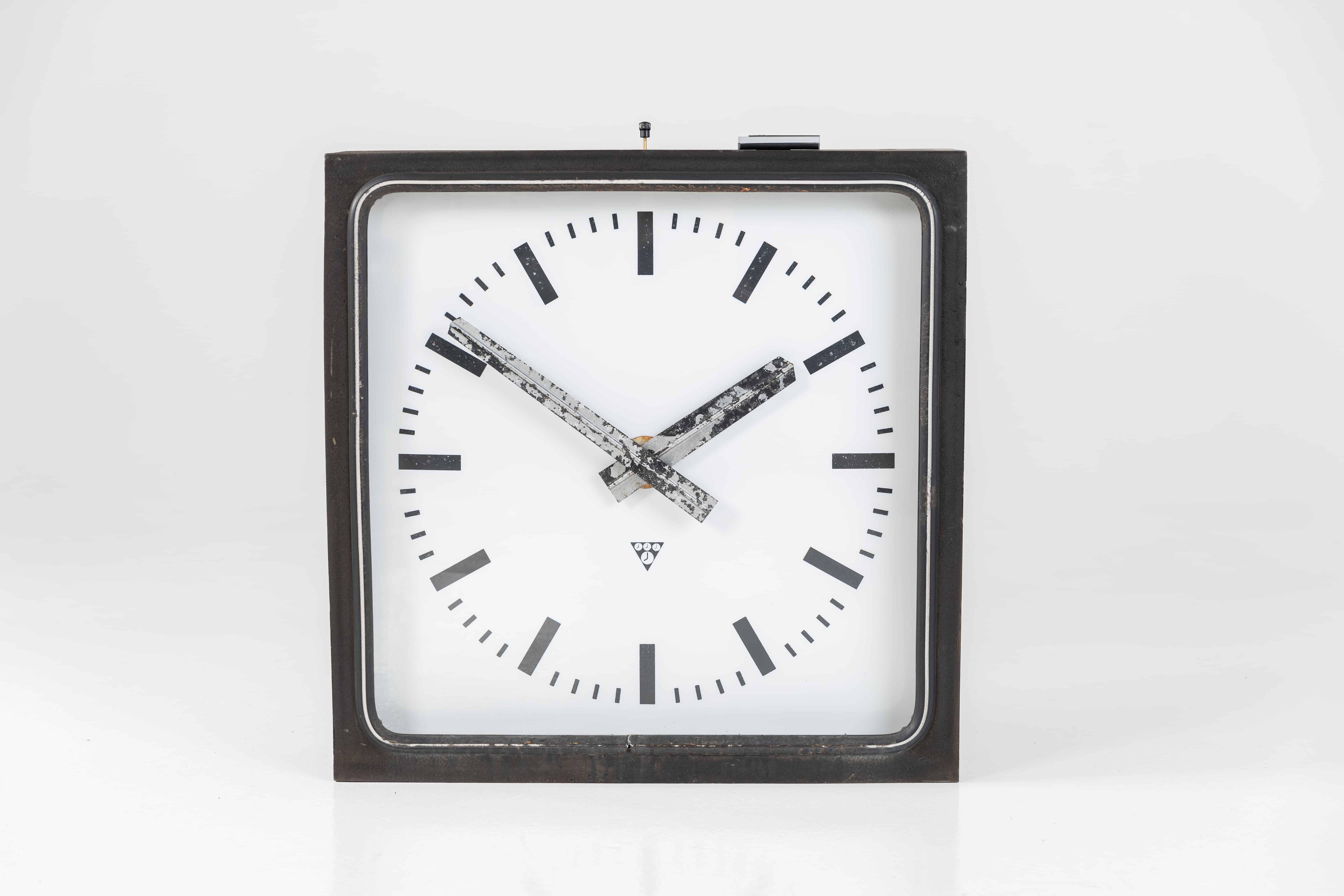 A beautiful example of a huge single sided illuminated wall clock manufactured by Pragotron. c.1960. Measure: 28