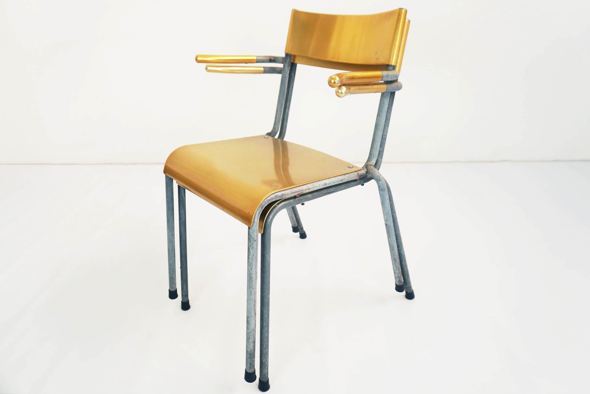 Beautiful yellow aluminum stackable chairs made in Switzerland during the '40s
13 pieces available for indoor or garden.