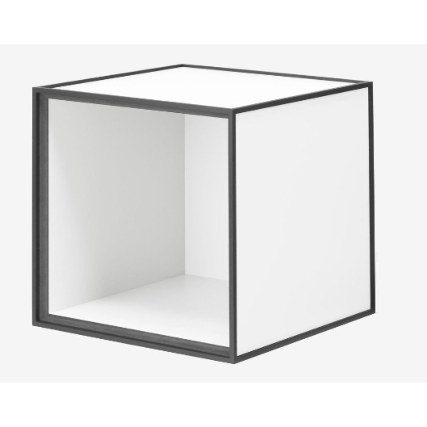 28 white frame box by Lassen
Dimensions: W 28 x D 28 x H 28 cm 
Materials: Finér, Melamin, Melamin, Melamine, Metal, Veneer, Oak
Also available in different colors and dimensions. 

By Lassen is a Danish design brand focused on iconic designs