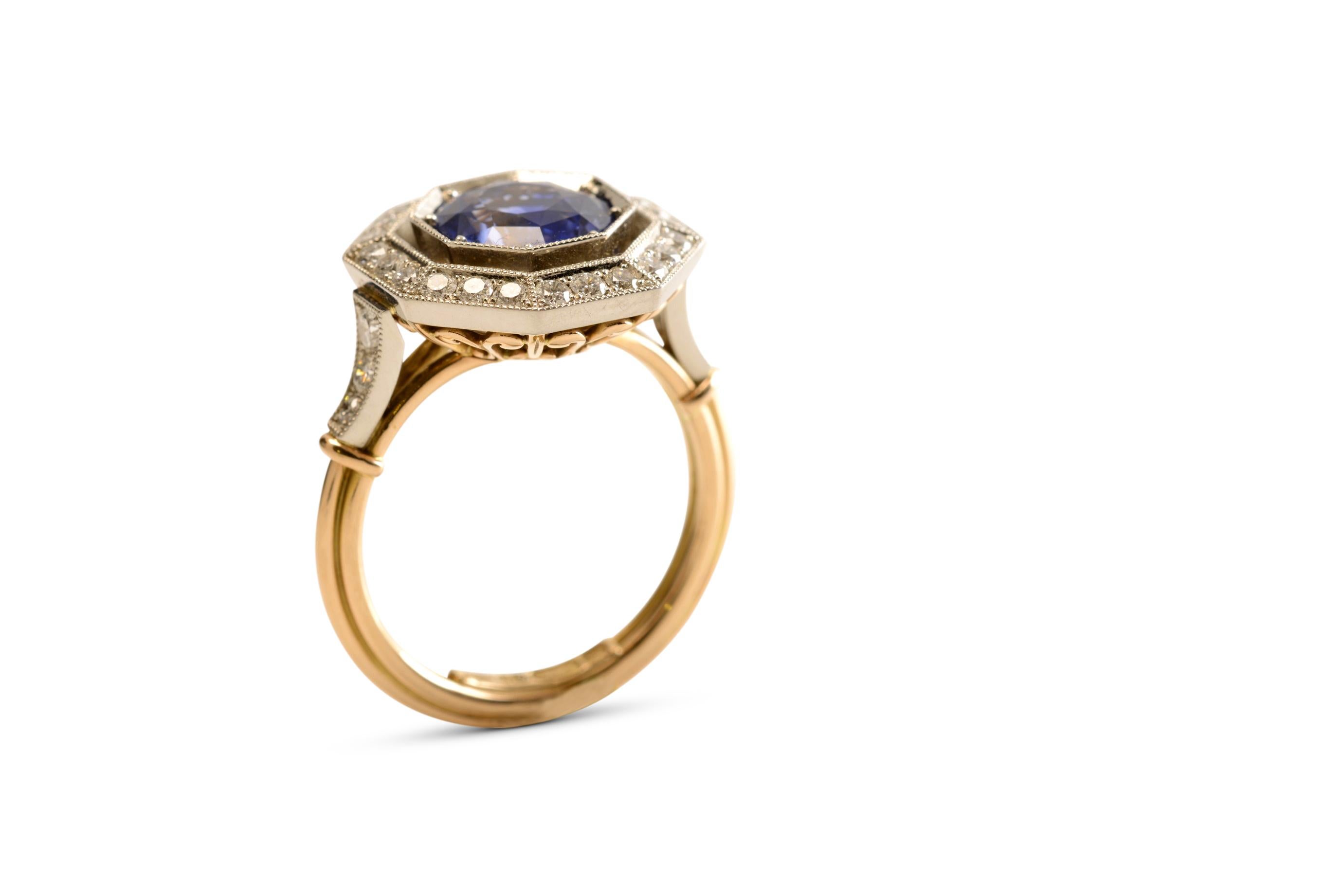 Round Cut 2.80 Carat Blue Ceylon Sapphire and Octagonal Diamond Halo Ring For Sale