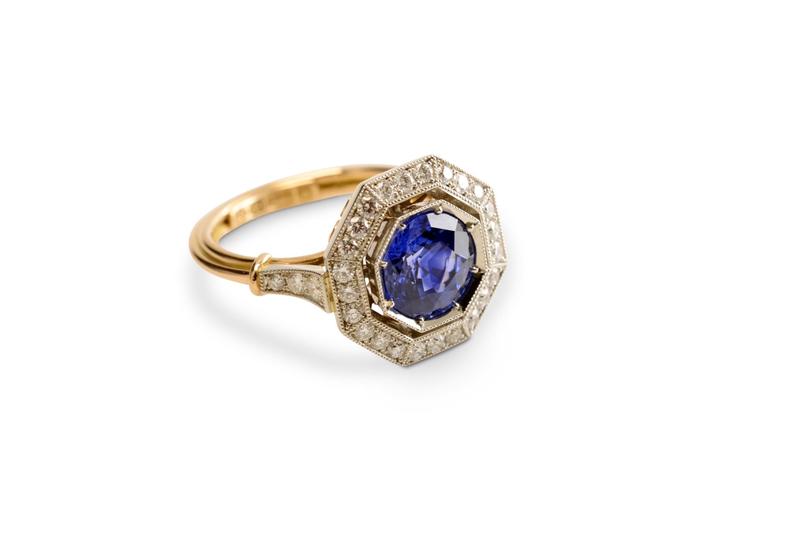 Every intricate detail has been considered to create this Edwardian inspired ring. A 2.80 carat round brilliant cut blue Ceylon sapphire sits in a fine octagonal shaped setting, its surrounded by a diamond set halo and supported by sweeping diamond