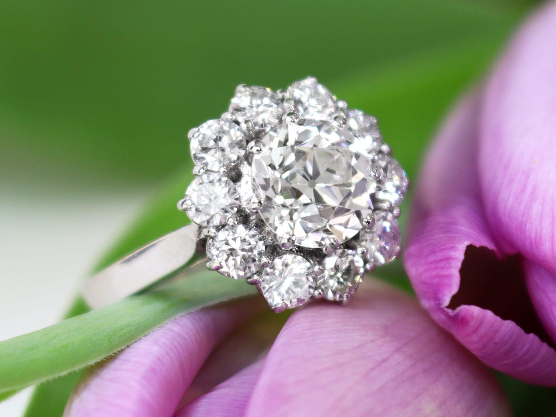 Old European Cut 2.80 Carat Diamond and Platinum Cluster Engagement Ring For Sale