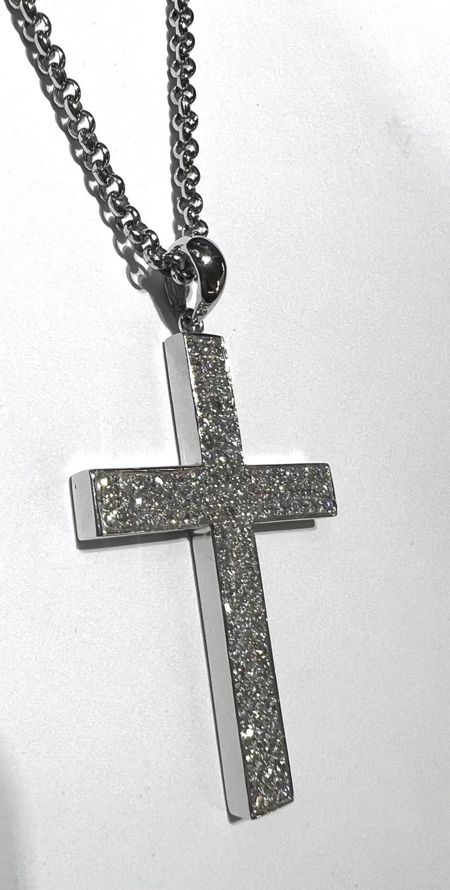 2.80 Carat Diamond Cross Necklace 

Stones: 114 Diamond
Stone Shape: Round 
Stone Carat: 2.80 Carat 
Stone Color: G-I
Stone Clarity: SI Clarity
Material: 14K White Gold 
Chain: Round Link 20 Inch Chain with Lobster Clasp
Chain: 3MM 

Pendant