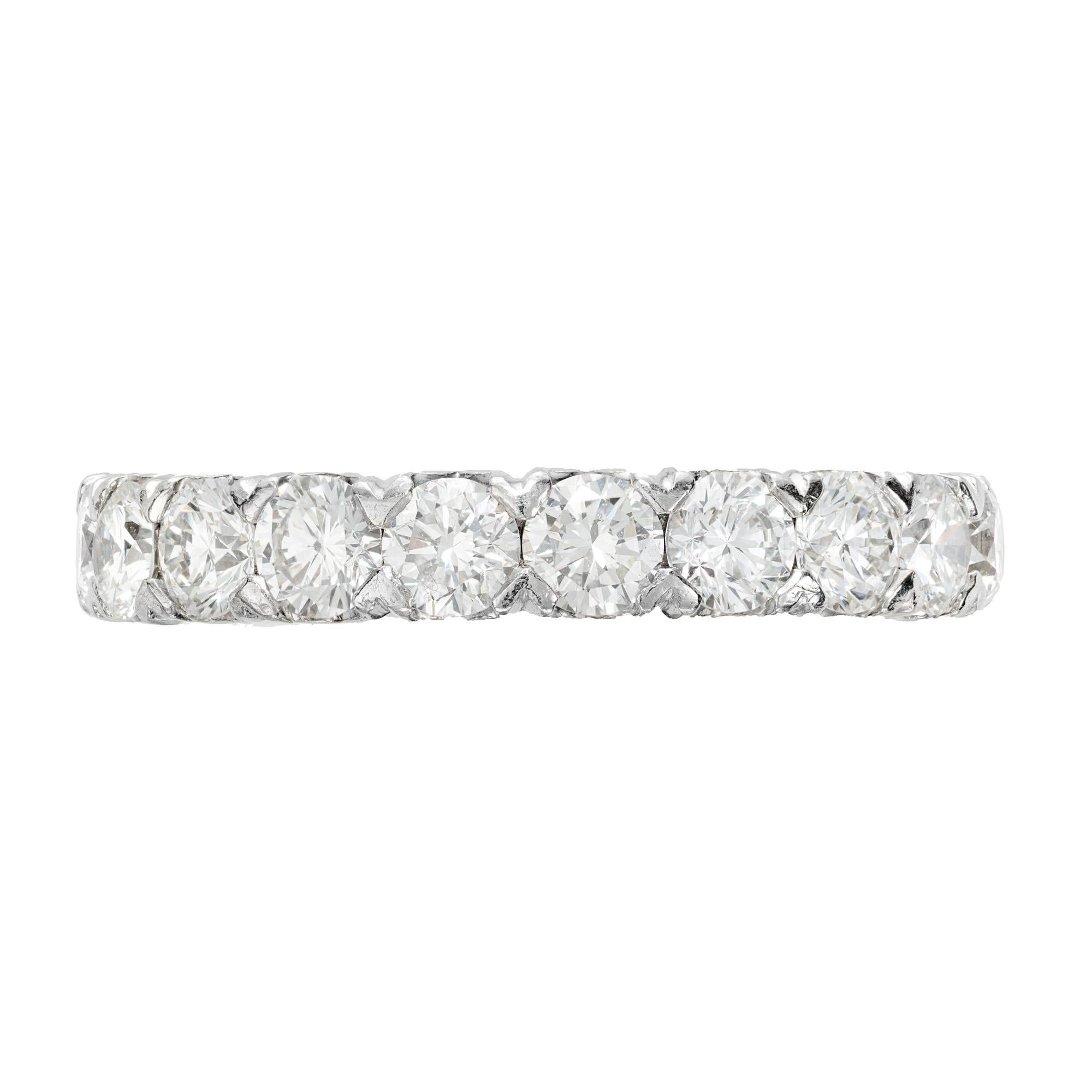 1950's Handmade custom diamond eternity band ring. 20 round brilliant cut diamonds set in a platinum setting. 

20 round brilliant cut diamonds, F-G VS approx. 2.80cts
Size 6.5 and sizable 
Platinum 
Stamped: PT 950
5.9 grams
Width at top: