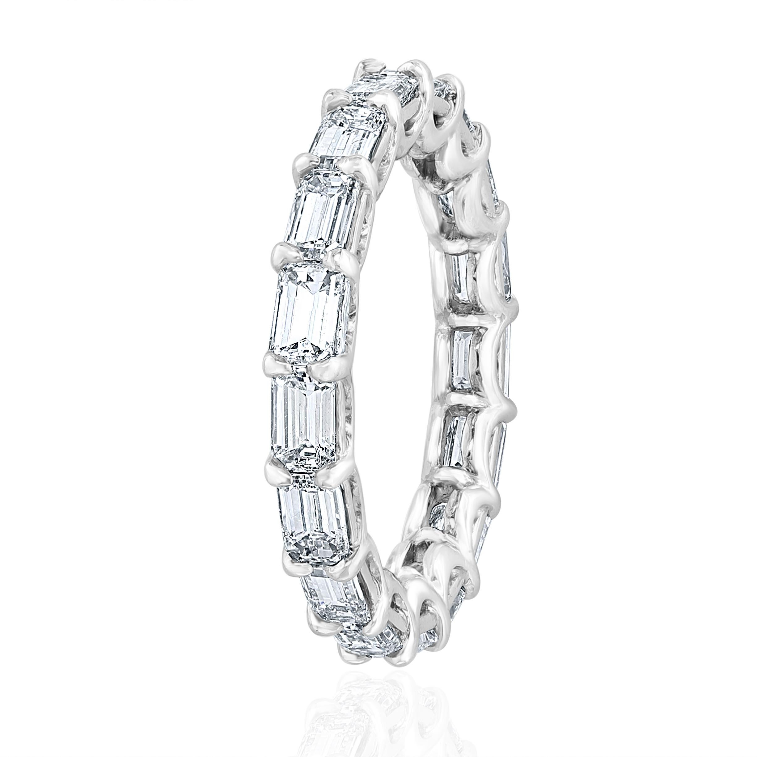 Classic Emerald Cut Diamond Eternity Band Horizontally Set featuring 17 Stones weighing a Total of 2.80 Carats. 
Diamonds are of F color and VS Clarity.
Set in Platinum.
Size 6