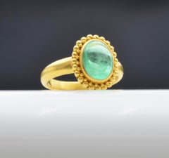 2.80 Carat Emerald and 22 Karat Yellow Granular Gold Ring