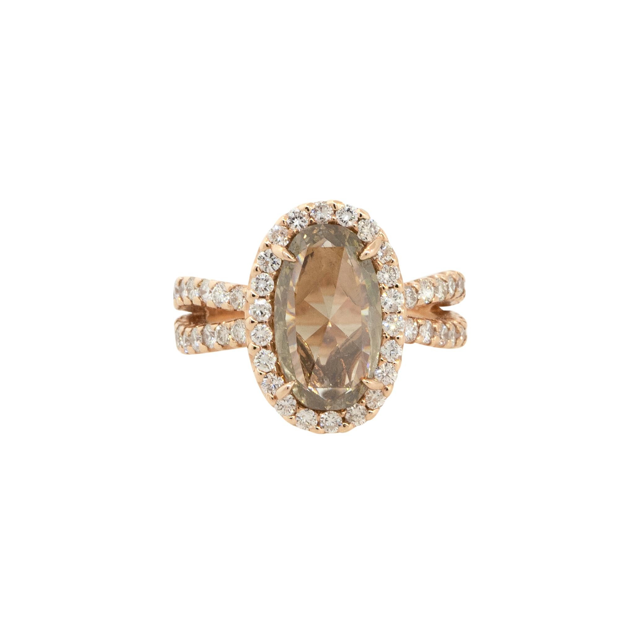 14k Rose Gold 2.80ctw Fancy Brown Oval Diamond Halo Ring
Material: 14k Rose Gold
Center Diamond Details: Approx. 2.80ctw Oval Cut Diamond. Center Diamond is Fancy Brown in color and SI2 in clarity
Mounting Details: Approx. 1.00ctw of Round Diamonds