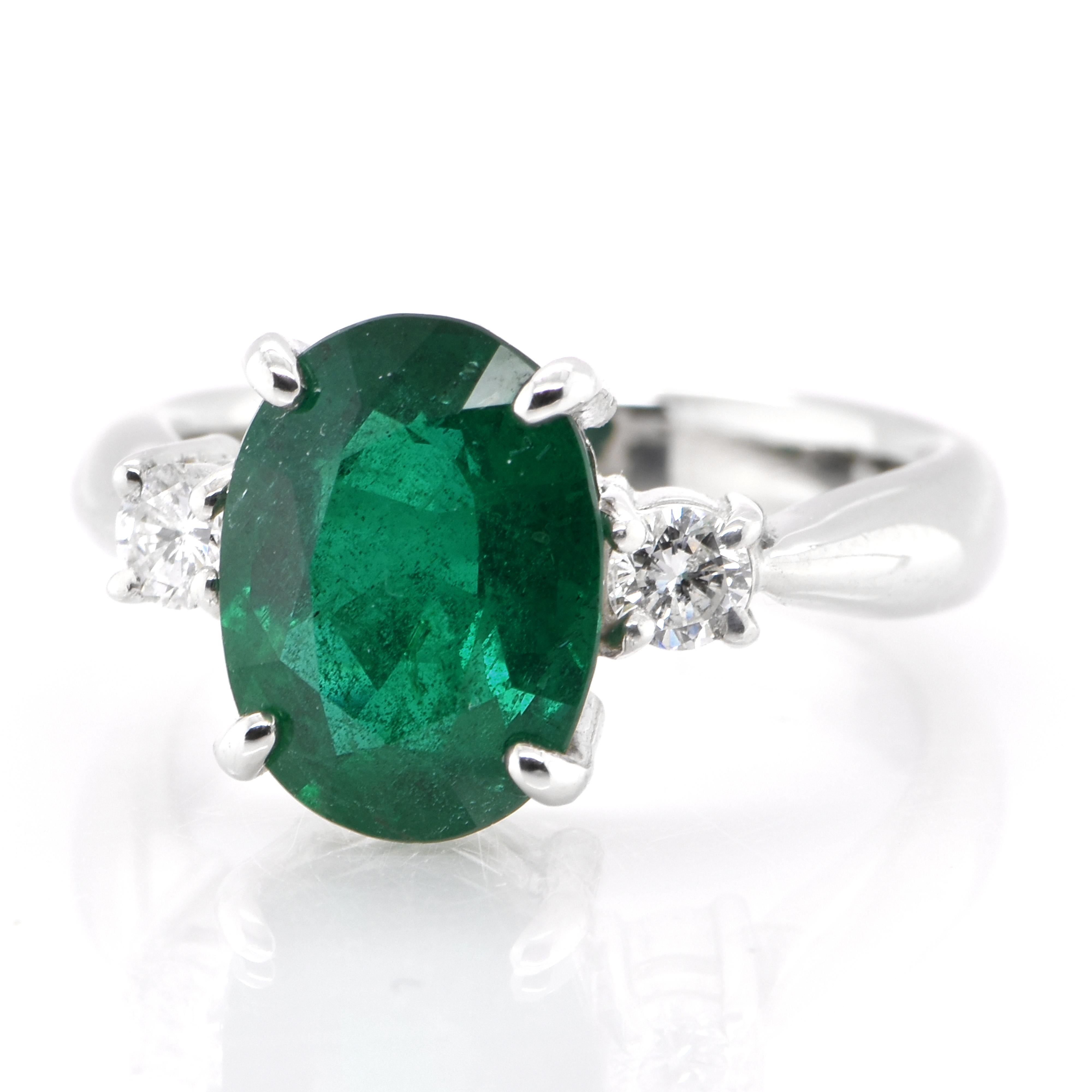 A stunning ring featuring a 2.809 Carat Natural Emerald and 0.18 Carats of Diamond Accents set in Platinum. People have admired emerald’s green for thousands of years. Emeralds have always been associated with the lushest landscapes and the richest