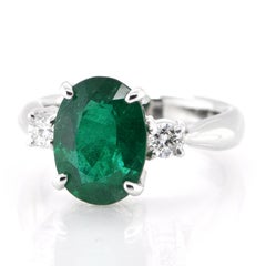2.80 Carat Natural Oval-Cut Emerald and Diamond Ring Set in Platinum