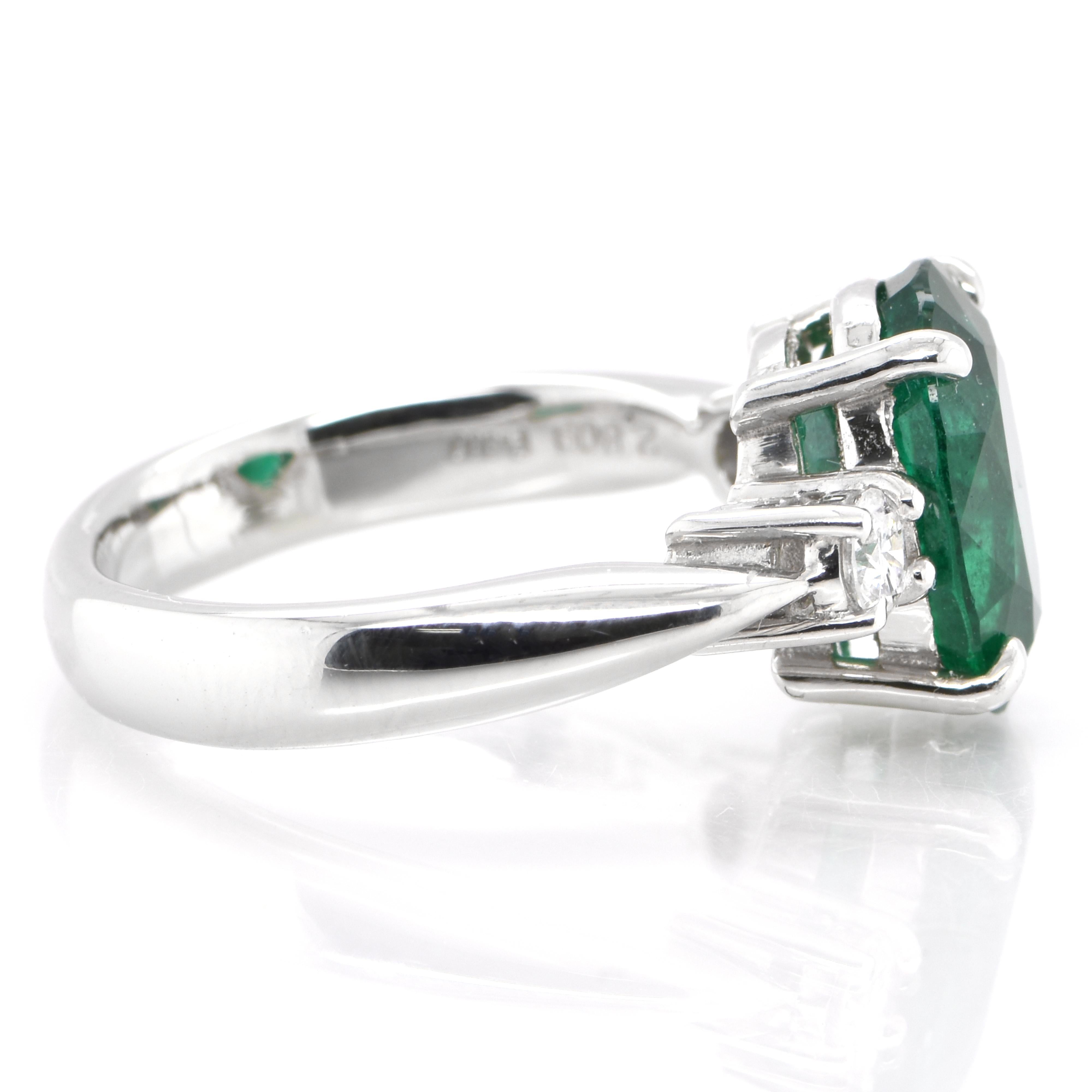 Modern 2.80 Carat Natural Oval-Cut Emerald and Diamond Ring Set in Platinum For Sale