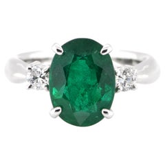Vintage 2.80 Carat Natural Oval-Cut Emerald and Diamond Ring Set in Platinum