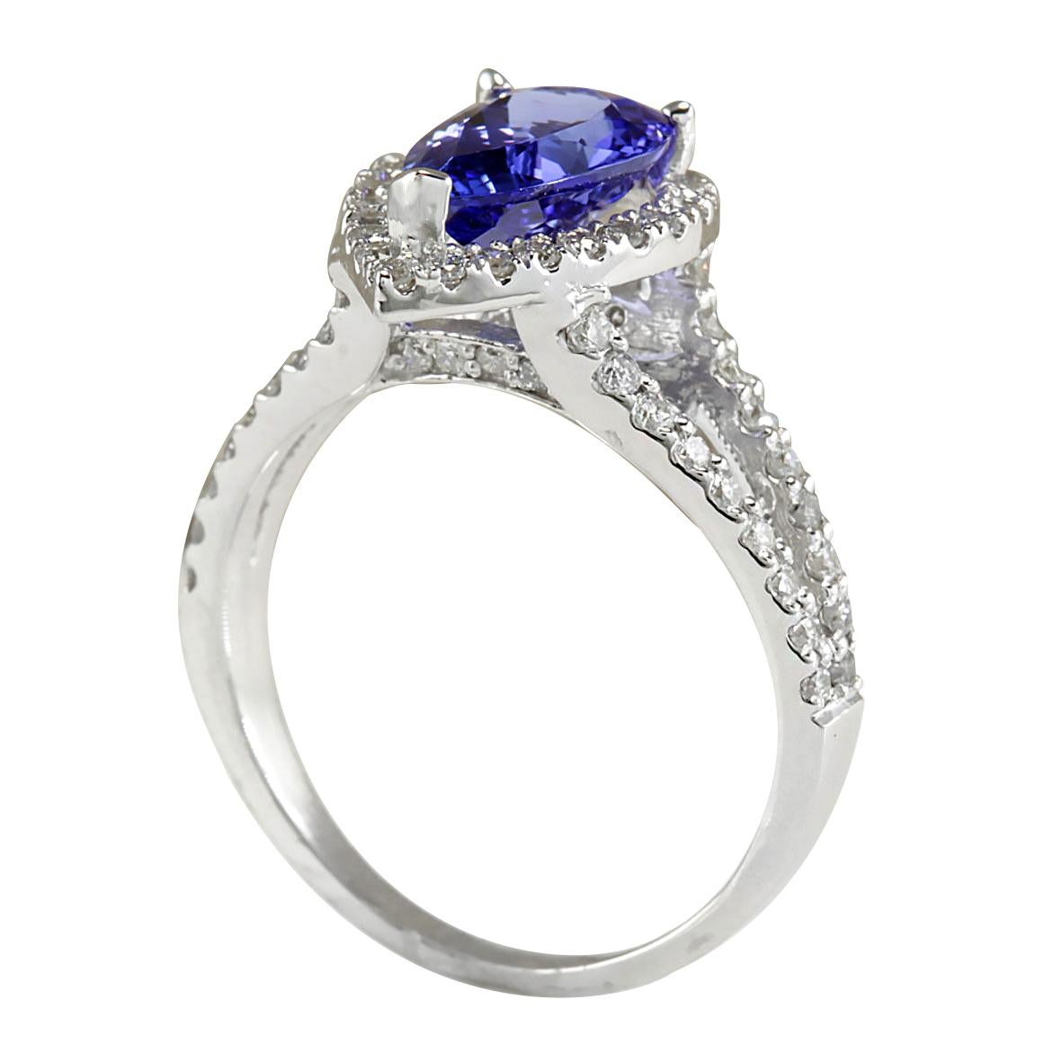 2.80 Carat Natural Tanzanite 14 Karat White Gold Diamond Ring
Stamped: 14K White Gold
Total Ring Weight: 3.5 Grams
Total Natural Tanzanite Weight is 1.80 Carat (Measures: 11.00x7.00 mm)
Color: Blue
Total Natural Diamond Weight is 1.00 Carat
Color: