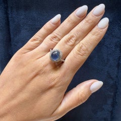 2.80 Carat Oval Cabochon Blue Star Sapphire and Diamond Halo Ring