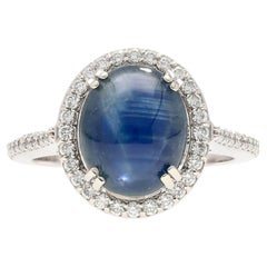 2.80 Carat Oval Cabochon Blue Star Sapphire and Diamond Halo Ring