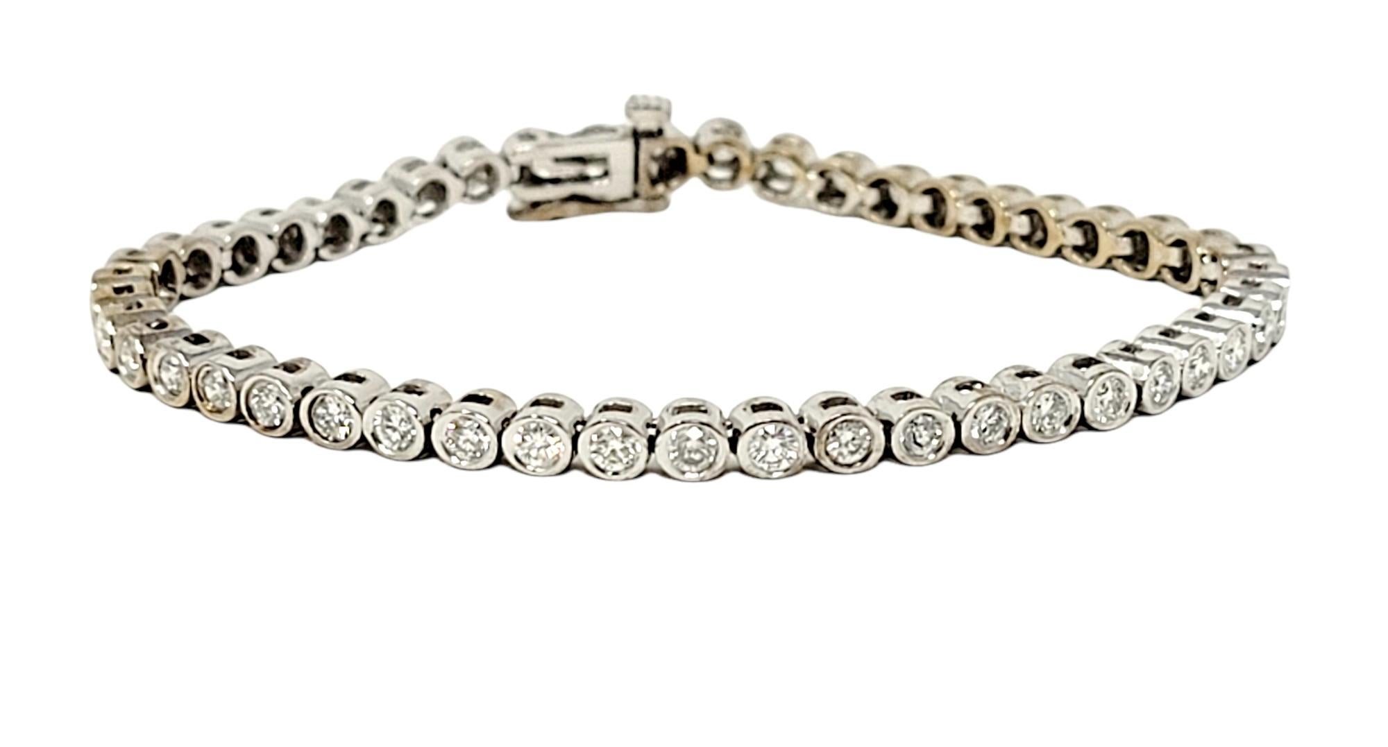 This is an absolutely gorgeous diamond tennis bracelet that will stand the test of time. The elegant white gold setting paired with the timeless round diamonds makes this piece a true classic that will never go out of style. 
Features 47 sparkling