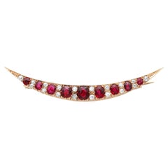 2.80 Carat Ruby, 0.50 Carat Diamond 9k Rose Gold Crescent Brooch Circa 1910