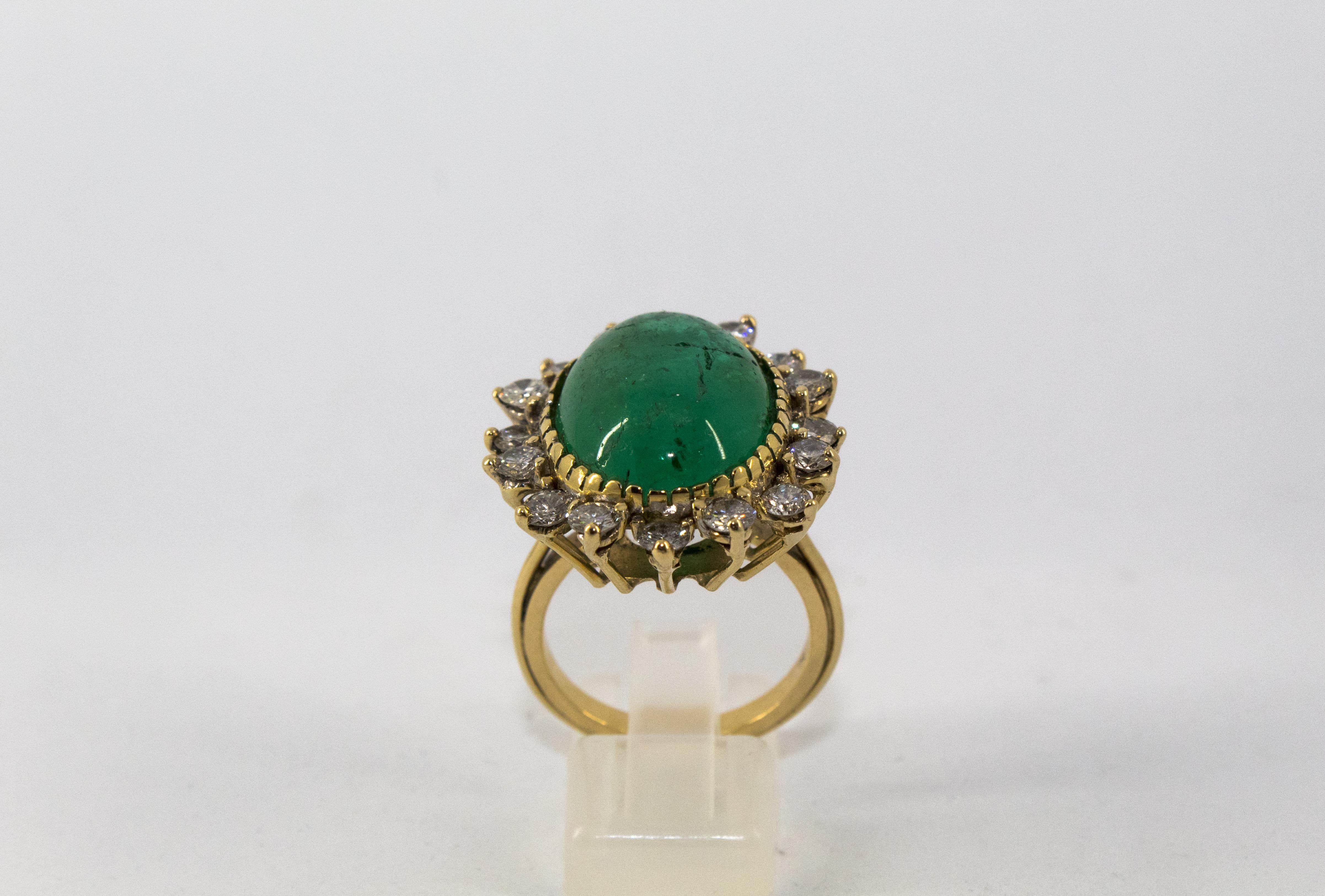 This Ring is made of 14K Yellow Gold.
This Ring has 2.80 Carats of White Diamonds (Old European Cut).
This Ring has a 16.00 Carats Zambian Emerald (Cabochon Cut).
Size ITA: 18 USA: 8 1/4
We're a workshop so every piece is handmade, customizable and