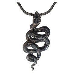 2.80 Carats Black and White Diamonds Snake Pendant