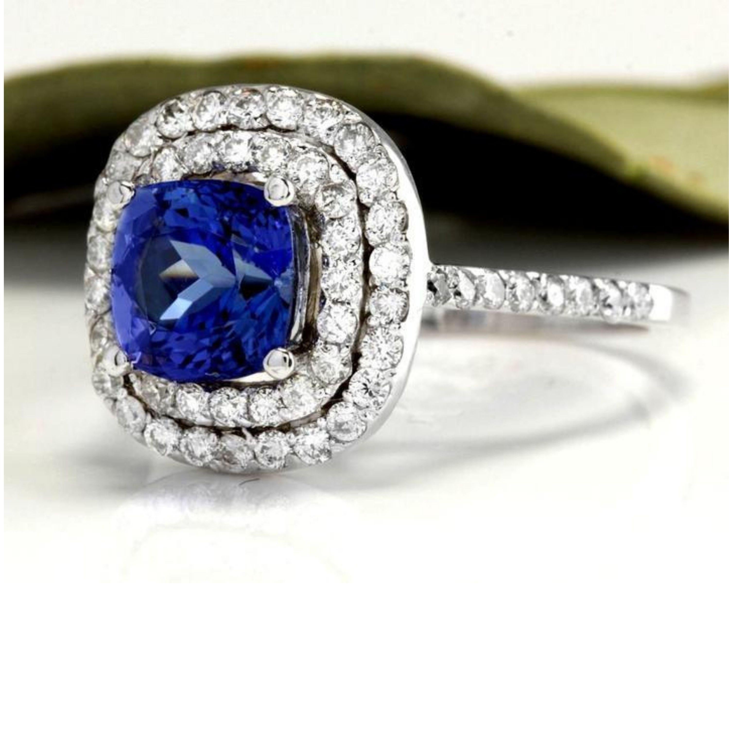 2.80 Carats Natural Very Nice Looking AAA+ Tanzanite and Diamond 14K Solid White Gold Ring

Total Natural Cushion Cut Tanzanite Weight is: 1.80 Carats

Natural Round Diamonds Weight: 1.00 Carats (color F-G / Clarity VS2-SI1)

Ring size: 7 (we offer
