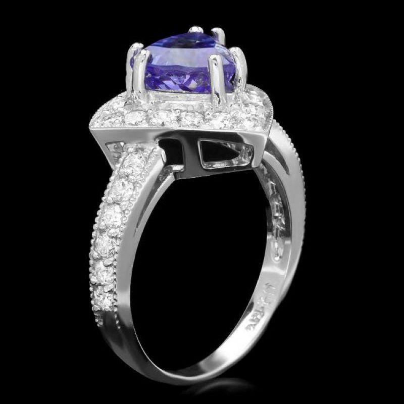 2.80 Carats Natural Tanzanite and Diamond 14K Solid White Gold Ring

Total Natural Triangular Tanzanite Weight is: Approx. 1.90 Carats 

Tanzanite Measures: Approx. 8.00 x 8.00 x 8.00 mm

Natural Round Diamonds Weight: Approx. 0.90 Carats (color G-H