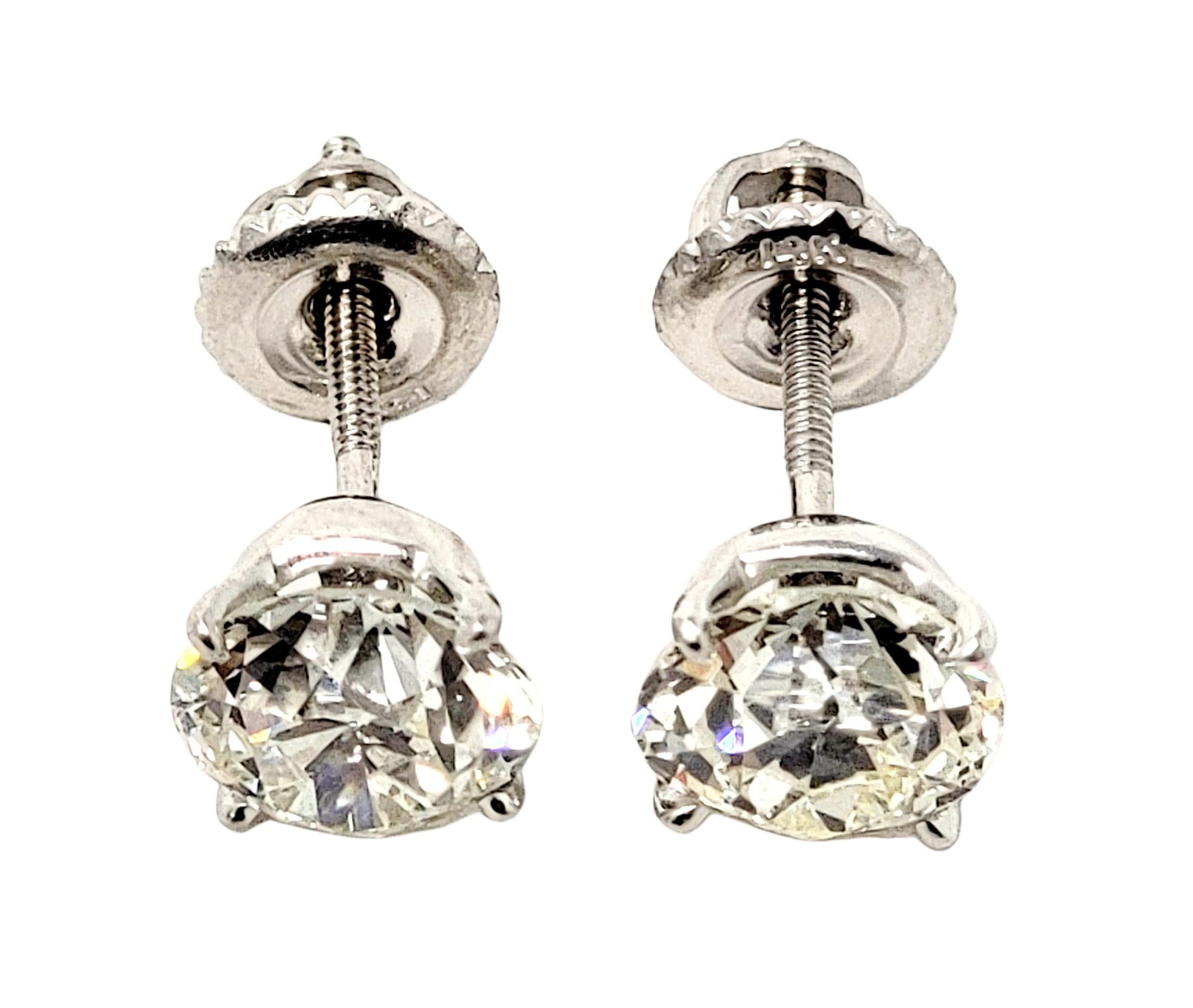 Round Cut 2.80 Carats Total Early Modern Brilliant Solitaire Diamond Stud Earrings in Gold For Sale