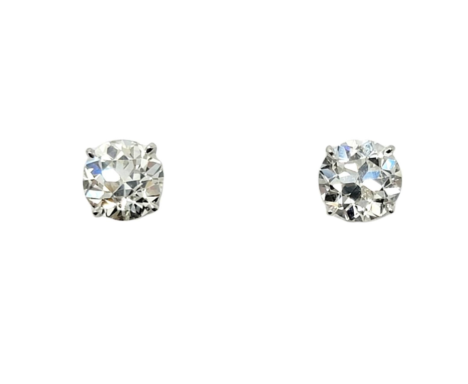 Women's or Men's 2.80 Carats Total Early Modern Brilliant Solitaire Diamond Stud Earrings in Gold For Sale