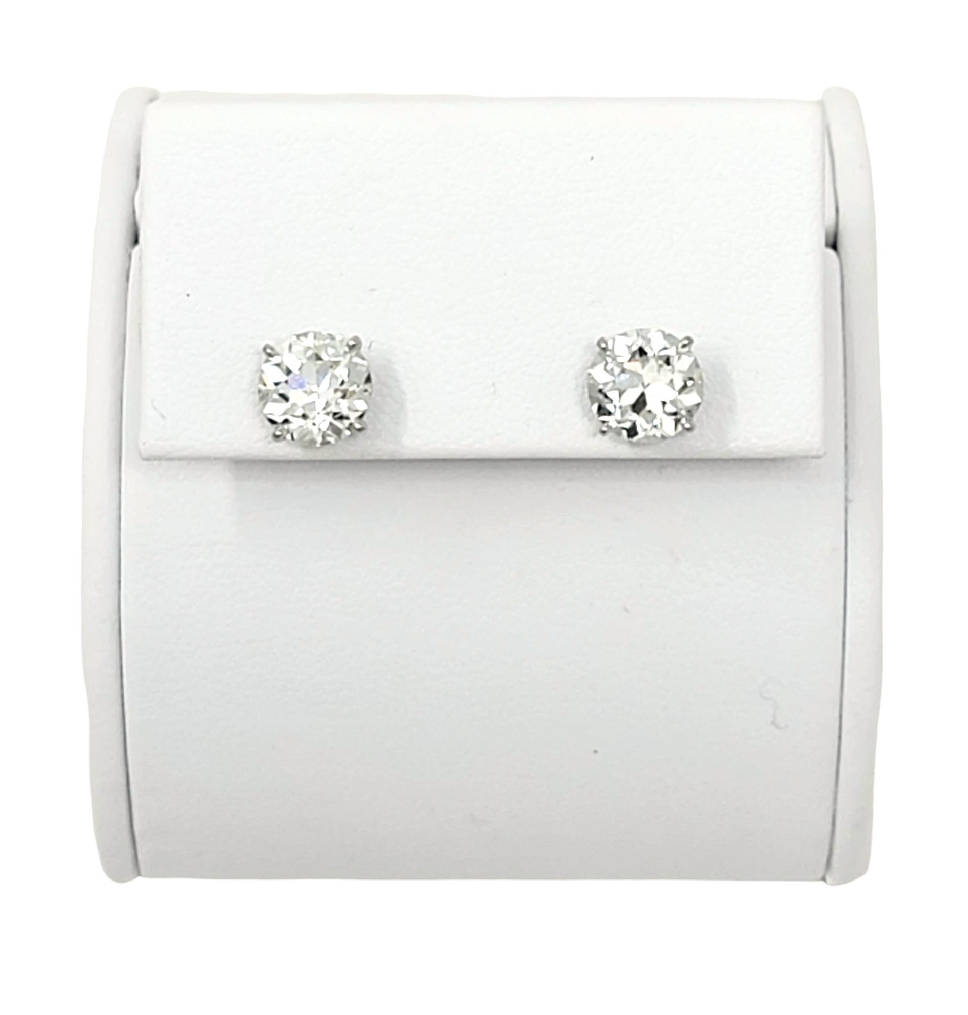 2.80 Carats Total Early Modern Brilliant Solitaire Diamond Stud Earrings in Gold For Sale 3