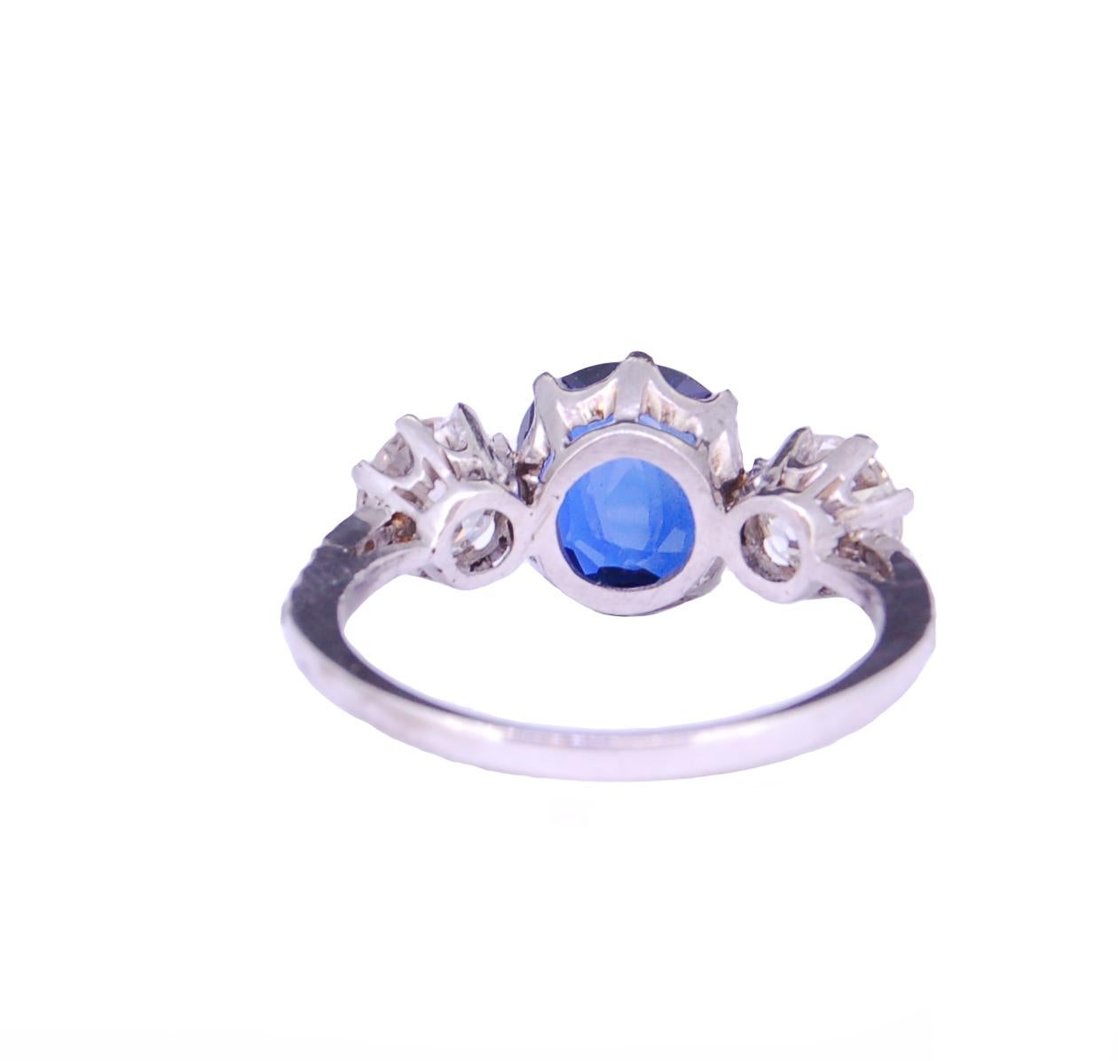 Oval Cut 2.80 Carat Burma Blue Sapphire and Diamond 3-Stone Ring For Sale