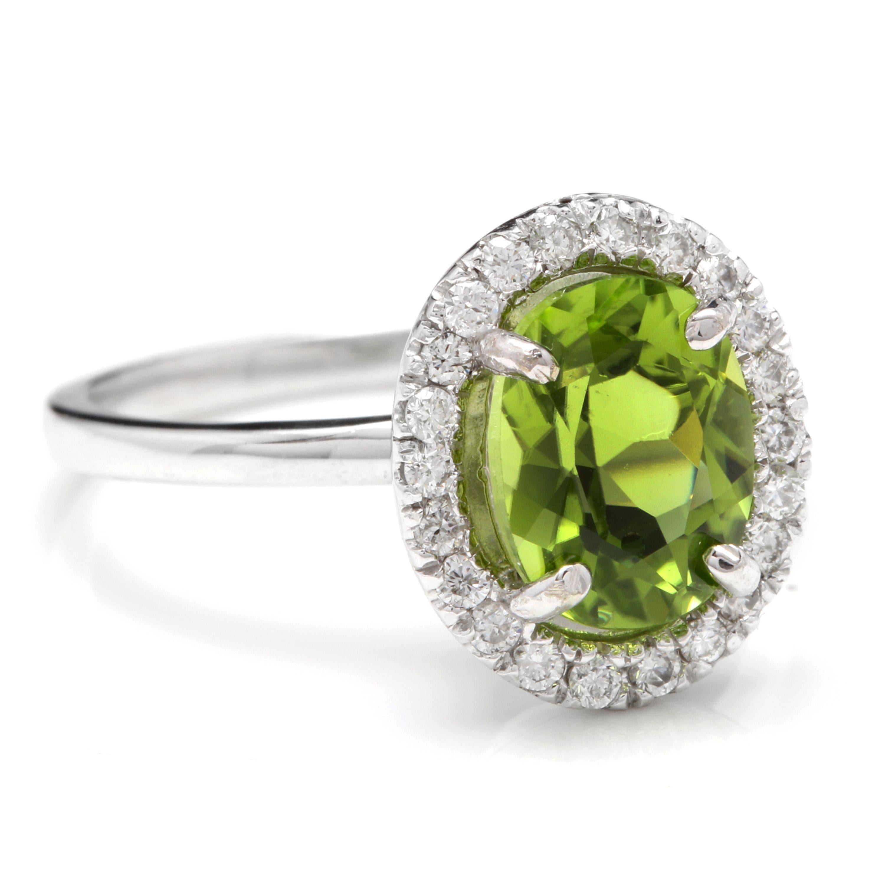 2.80 Carats Natural Very Nice Looking Peridot and Diamond 14K Solid White Gold Ring

Total Natural Oval Peridot Weight is: Approx. 2.50 Carats

Peridot Measures: Approx. 9.00 x 7.00mm

Natural Round Diamonds Weight: Approx. 0.30 Carats (color G-H /