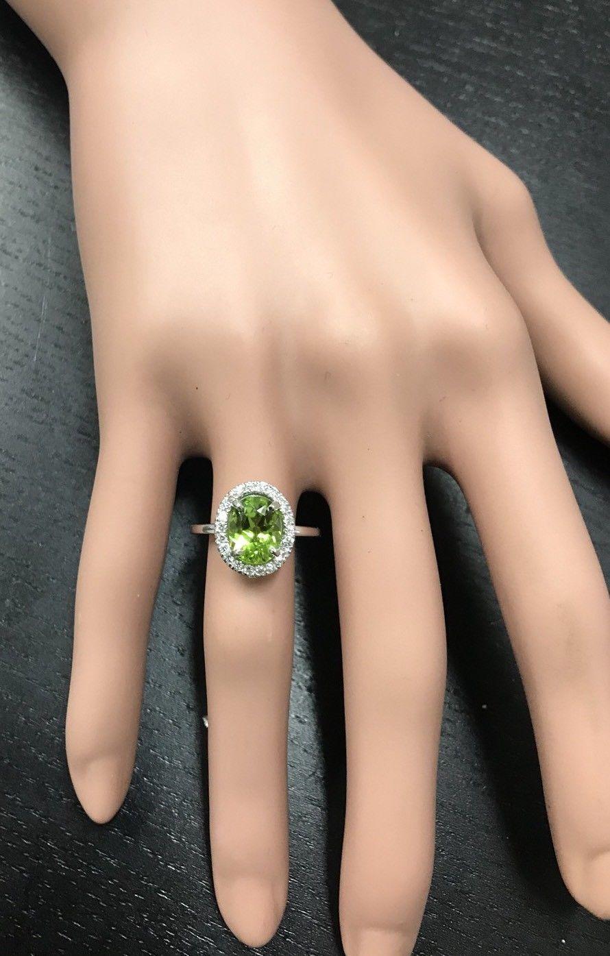 Women's 2.80 Carat Natural Very Nice Looking Peridot and Diamond 14K Solid Gold Ring For Sale