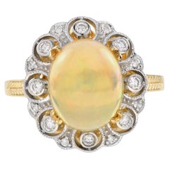 2.80 Ct. Opal and Diamond Antique Style Halo Ring in 14K Yellow Gold