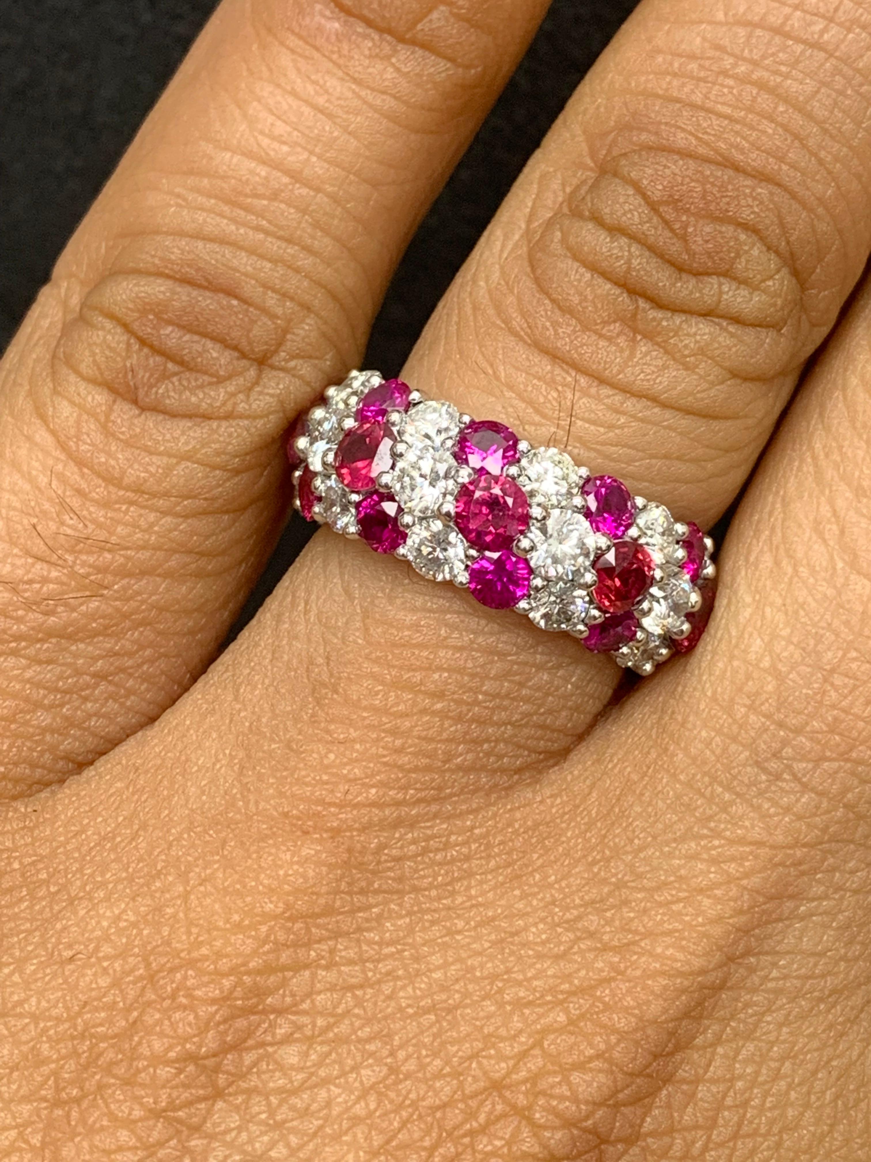 A unique and fashionable ZicZac ring showcasing three rows of round-shape 18 rubies and 15 diamonds, set in a band design. Rubies weigh 2.80 carats and Diamonds weigh 1.75 carats in total. A brilliant and masterfully-made piece.

Style is available