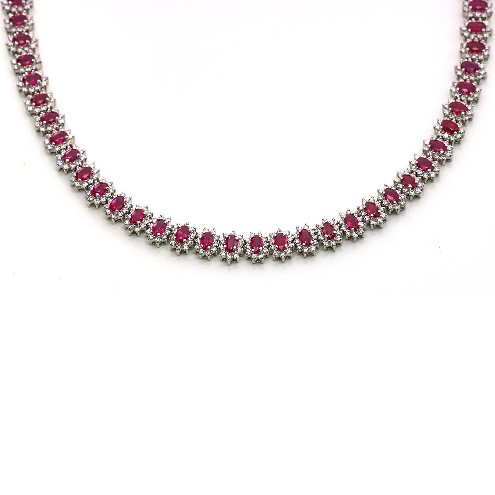 Ruby and diamond necklace in 14-karat white gold with GemLab appraisal. The necklace has 64 oval faceted natural Burma rubies, and 640 round-cut colorless to near-colorless diamonds. The appraisal value $64,000.

Ruby total carat weight, 18.00