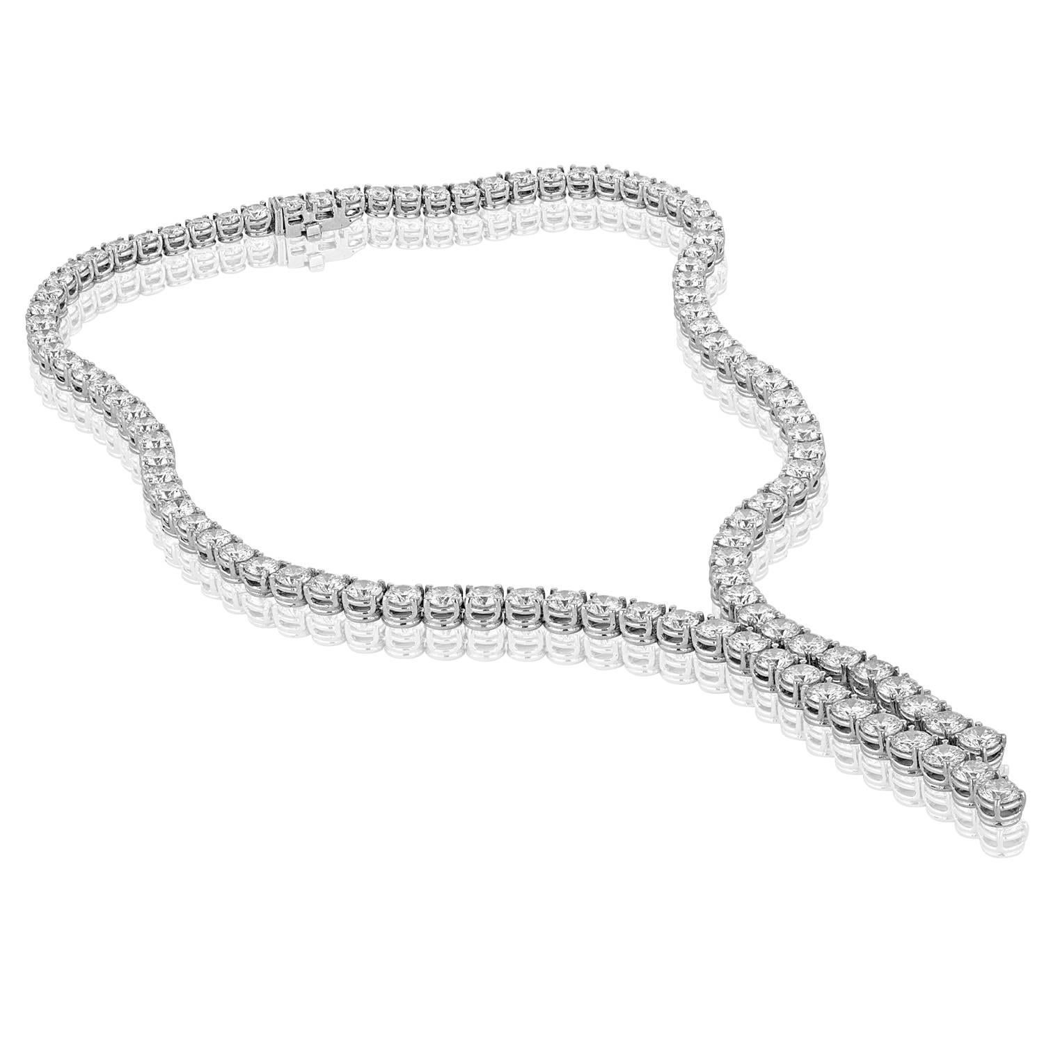 Modern 28.00 Carat E/F VS Diamond Gold Tennis Necklace with Gradual Split For Sale